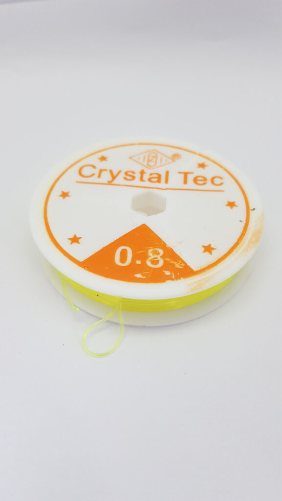 Еластичний шнур для виготовлення ювелірних виробів dalab crystal tec 0.8 мм жовтий — жовтий