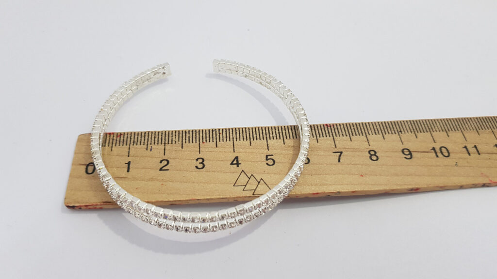 Браслет жіночий сріблястого кольору з кристалами ширина 10 мм 2 ряди каменів