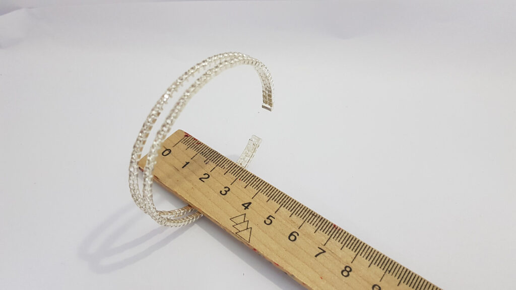 Браслет жіночий сріблястого кольору з кристалами ширина 10 мм 2 ряди каменів