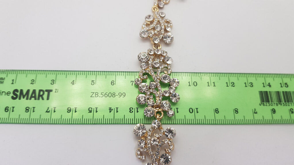 Браслет жіночий ажурний золотистий з каменями ширина 20 мм