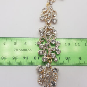 Браслет жіночий ажурний золотистий з каменями ширина 20 мм