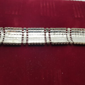 Браслет жіночий сріблястий з білими кристалами ширина 23 мм 8 рядів каменів