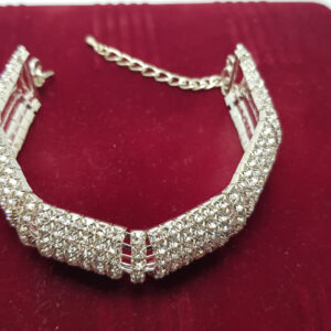 Браслет жіночий сріблястий з білими кристалами ширина 23 мм 8 рядів каменів