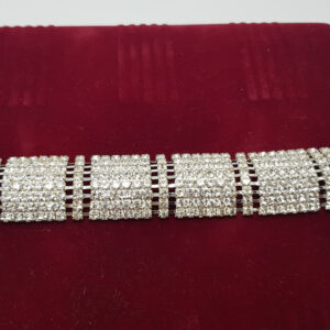 Браслет жіночий сріблястий з білими кристалами ширина 23 мм 8 рядів каменів