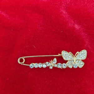 Брошка-шпилька золотиста з каменями