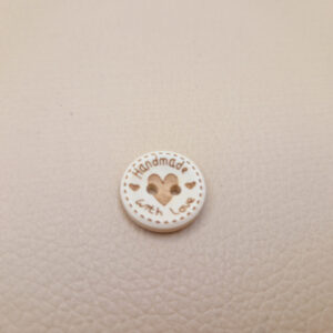 Гудзик з наскрізними отворами, діаметр 1.5 см (в наявності 2 розміри)