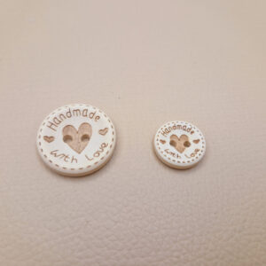 Гудзик з наскрізними отворами, діаметр 2.4 см (в наявності 2 розміри)