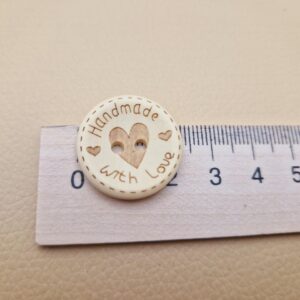 Гудзик з наскрізними отворами, діаметр 2.4 см (в наявності 2 розміри)